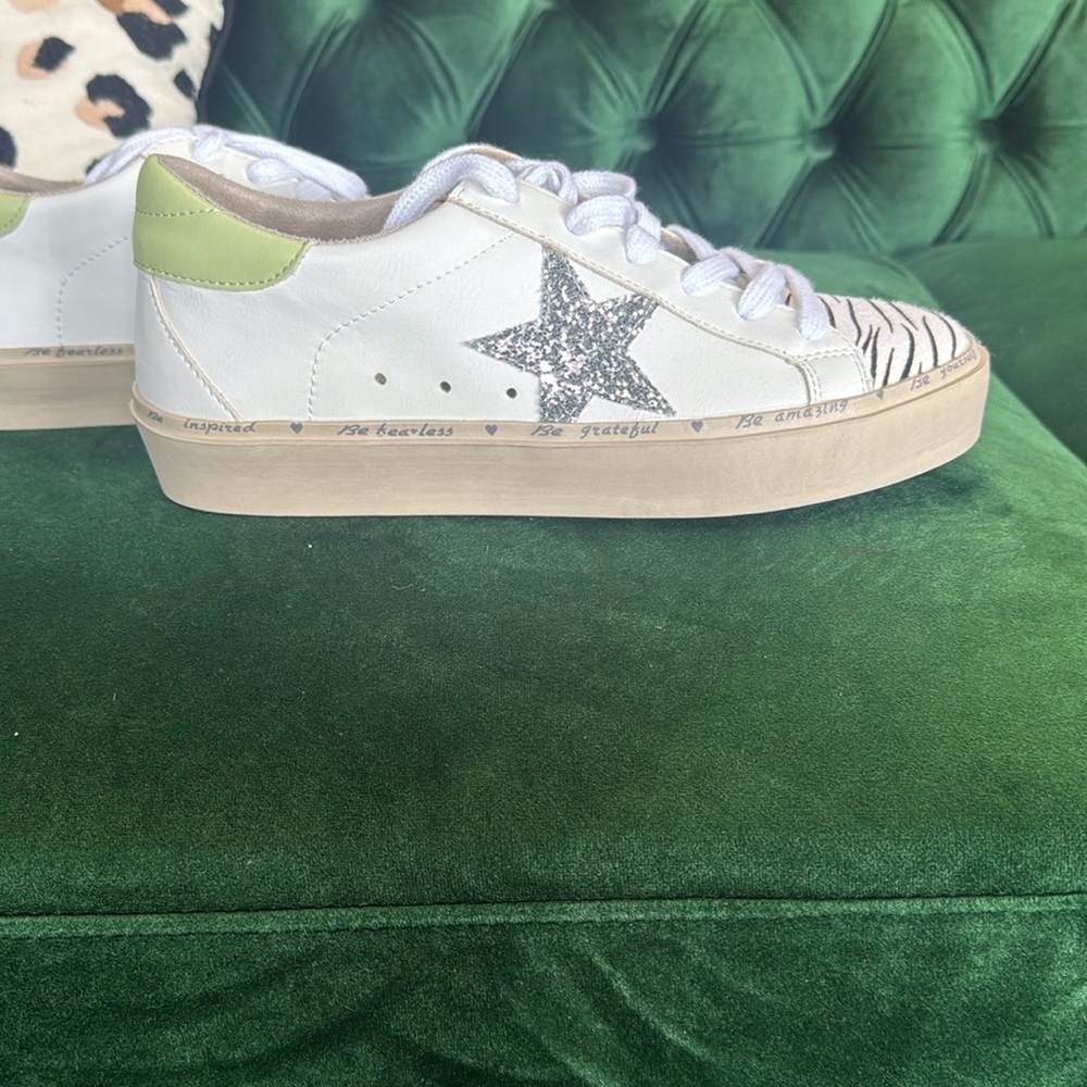 Reba White and Green Sneakers with Distinctive Style